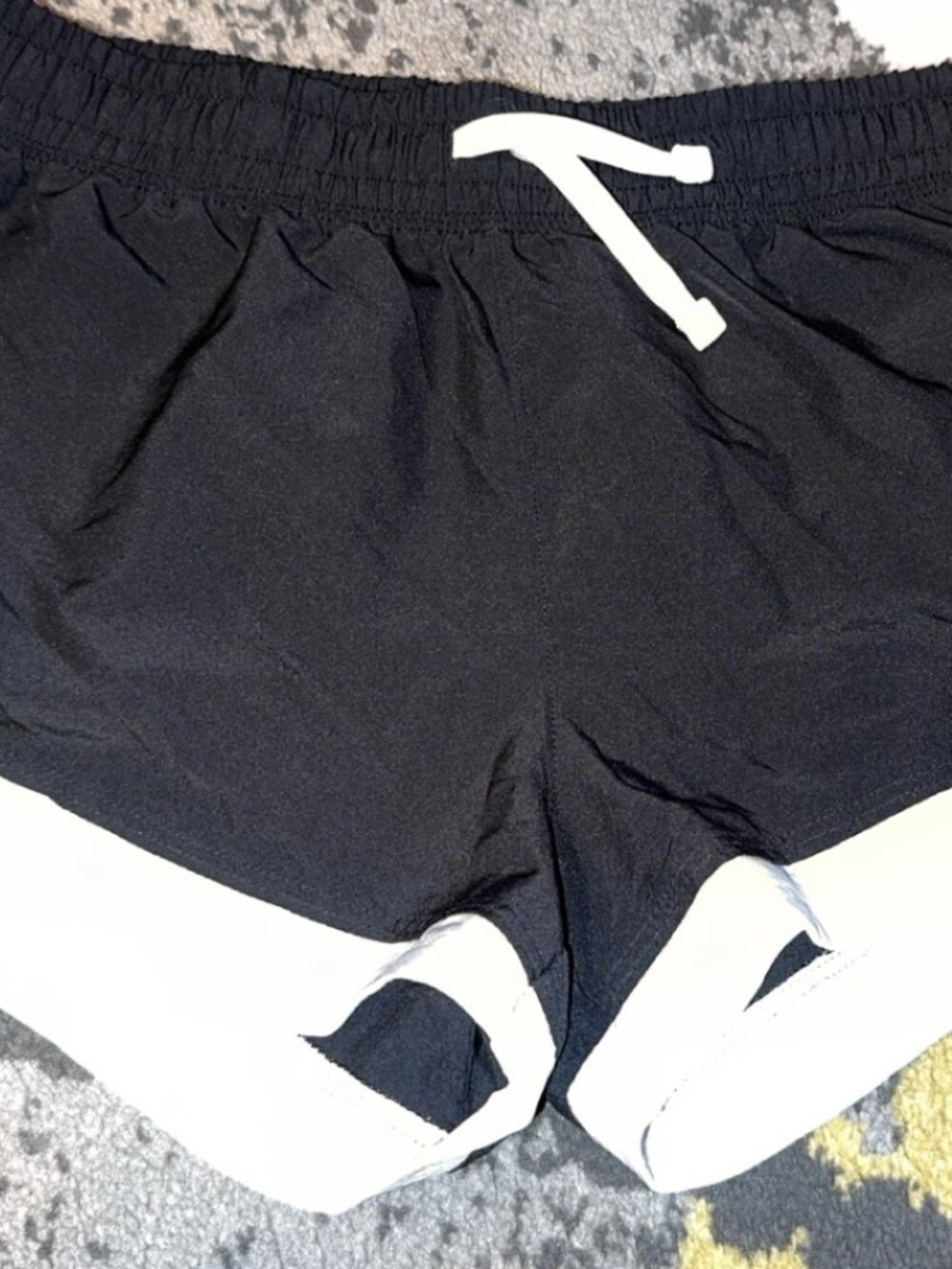 Under Armour girls black and white shorts